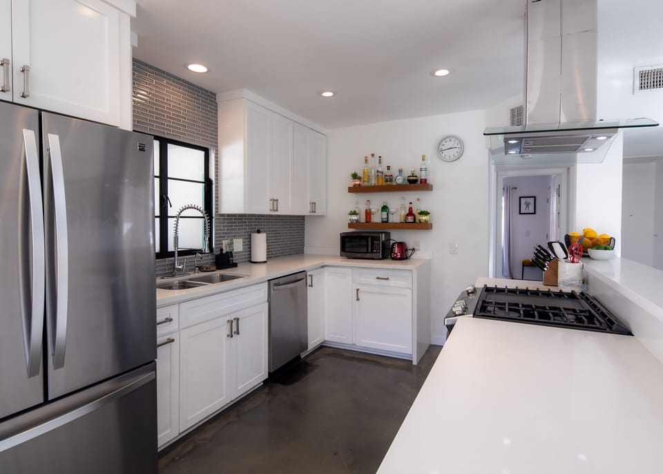 All stainless steel appliances with gas range