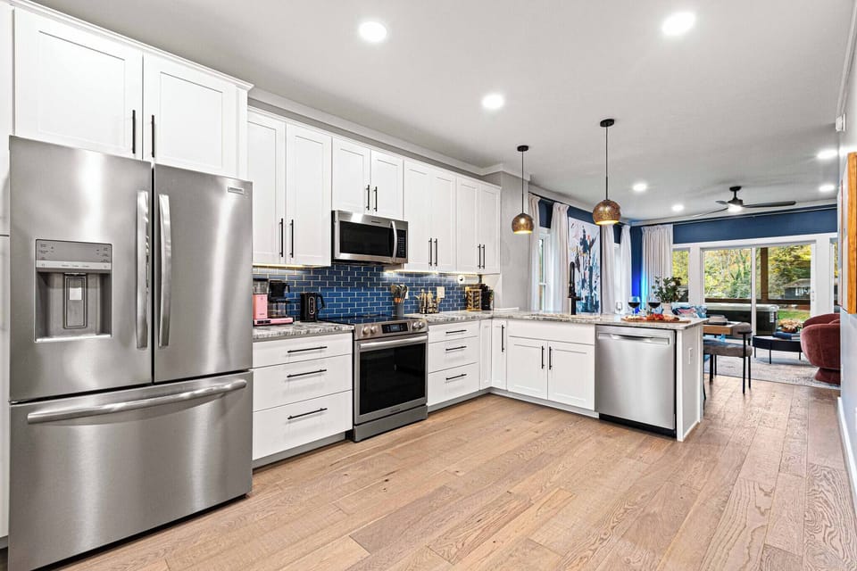 This well-appointed kitchen has ample counter space and modern appliances, making cooking a delight.