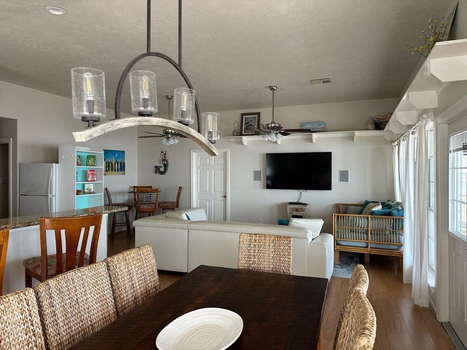 Large dining table with seating for eight.