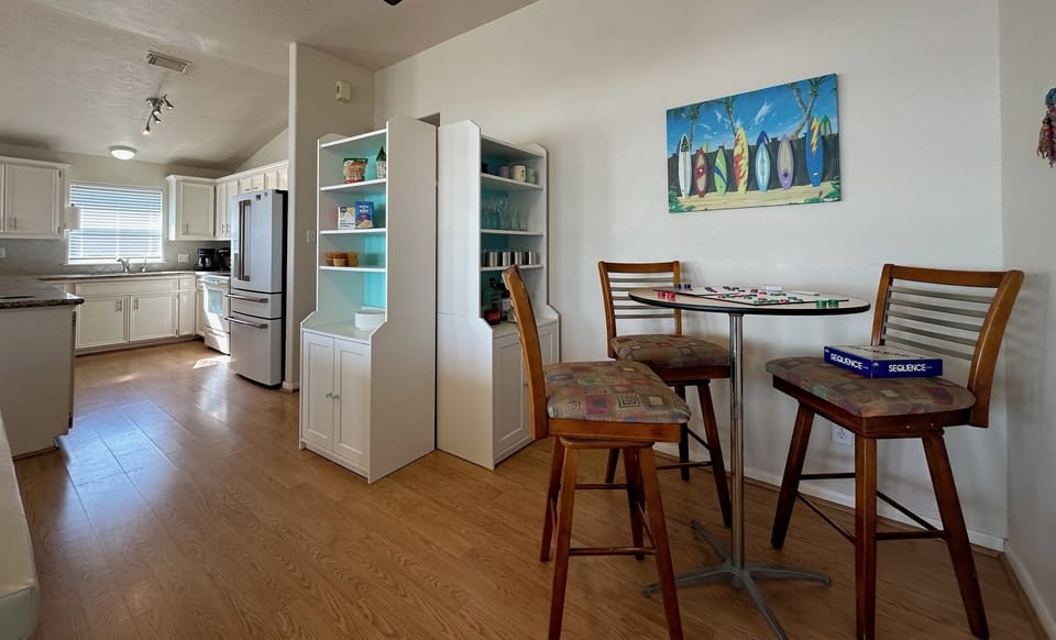 Two shelving units for pantry and bar items. 