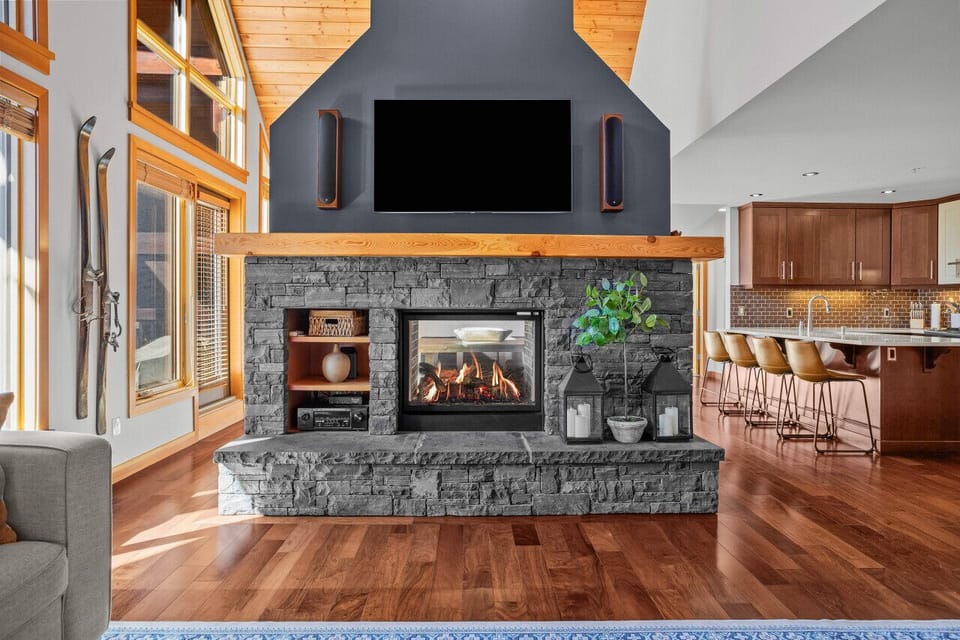 Get comfy in front of the statement fireplace and enjoy Netflix and Disney + on this 55` Smart TV with wall mounted speakers providing top sound quality