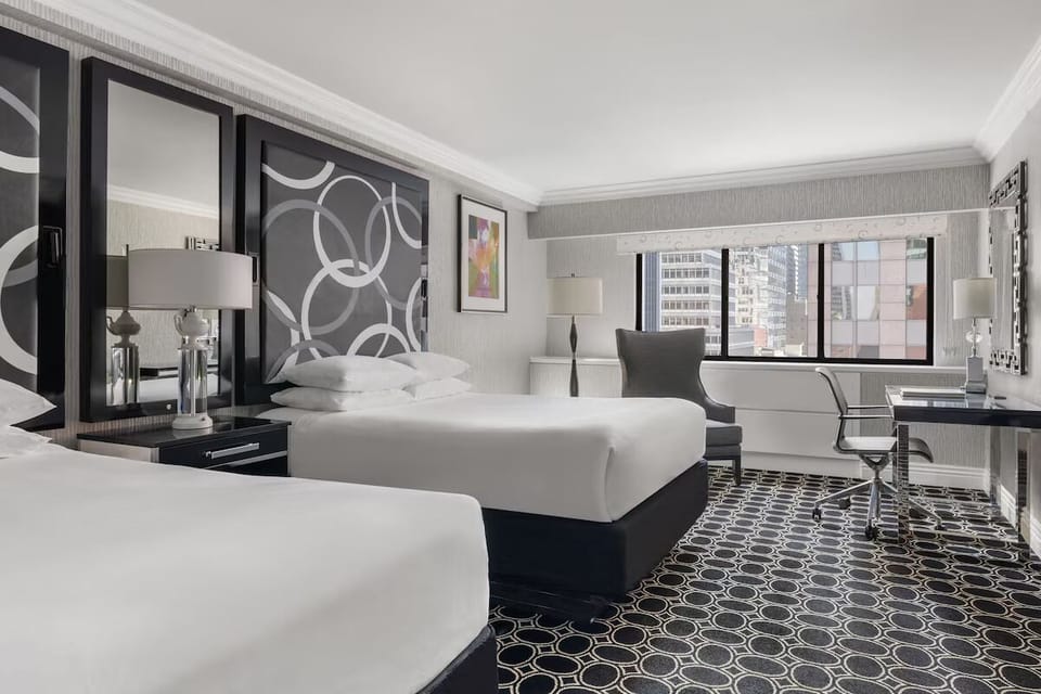 Settle into a stylish room with skyline views.