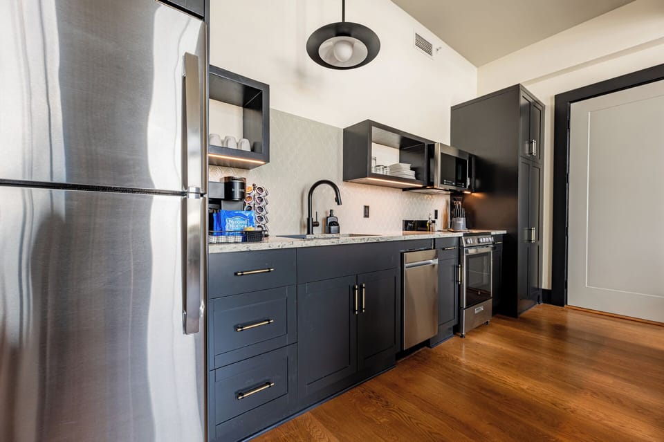 Fully equipped kitchen with modern appliances, offering everything you need for preparing meals or enjoying a morning coffee.