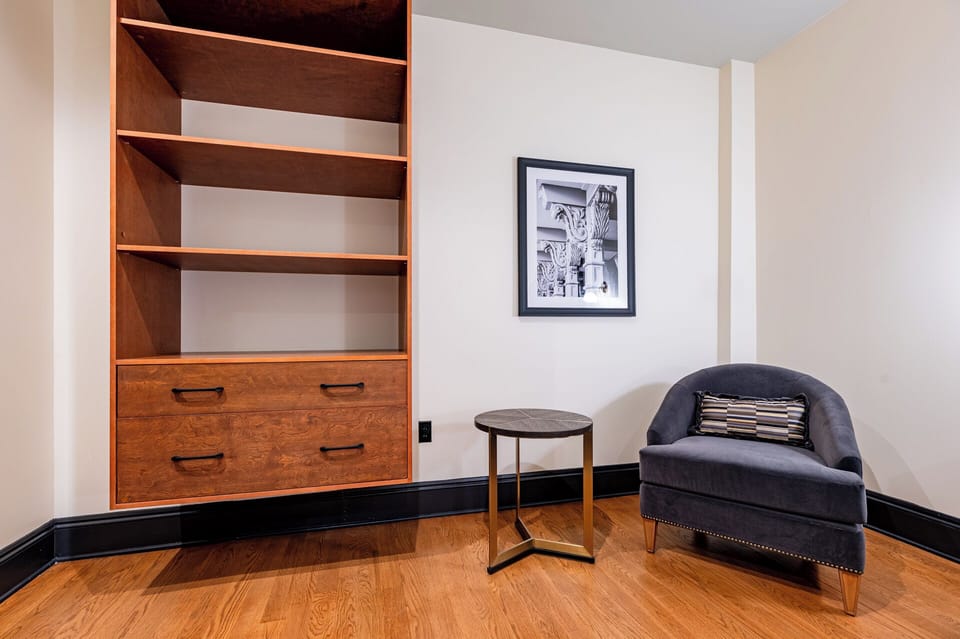 Bedroom 3 - Additional storage space and seating.