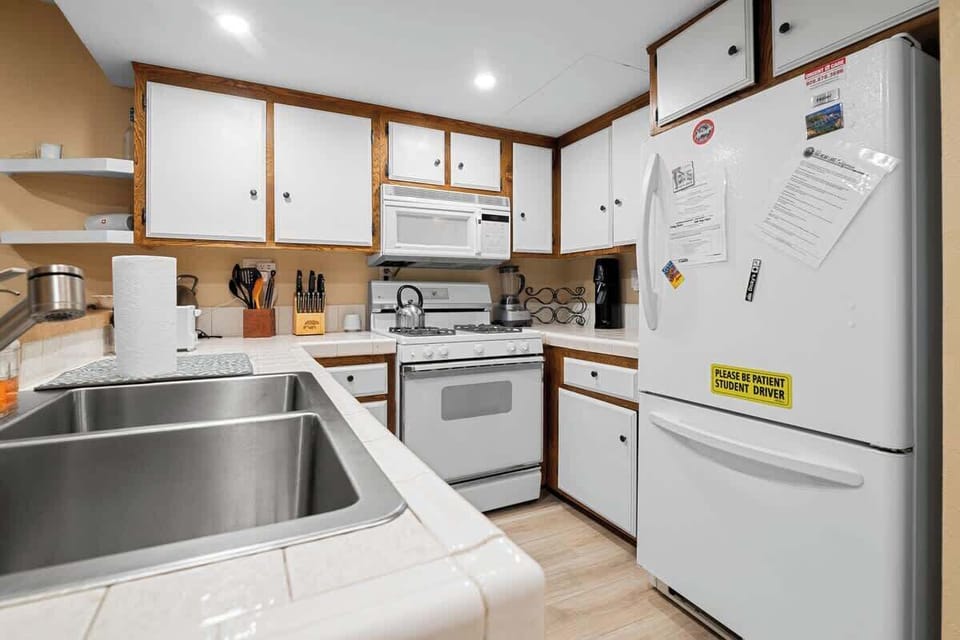 Full kitchen- Most items you need for cooking meals at home. 
Owner does visit often. They keep a few items in the freezer. 