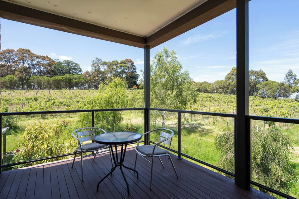 Private balcony with outdoor furniture, perfect for relaxation 