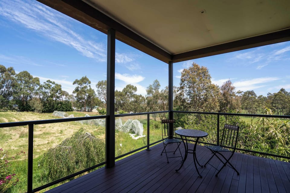 Private balcony with outdoor furniture, perfect for relaxation 