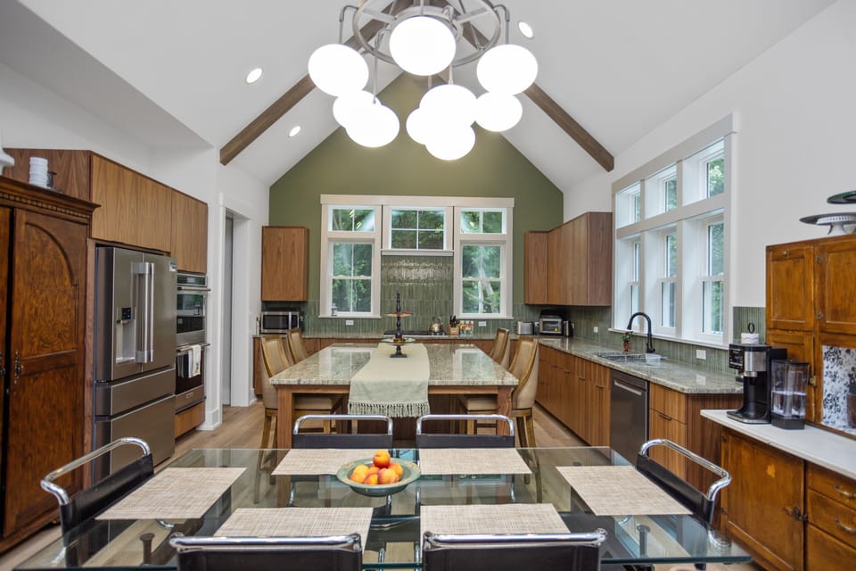 Large open concept kitchen and dining is the heart of the home