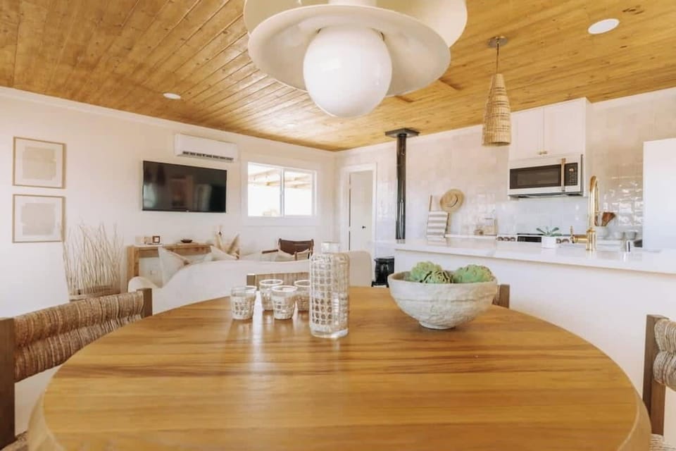 Open concept arrangement with dining room, kitchen, and living room all in one space. Gather around together enjoying each other's company no matter what you're doing!