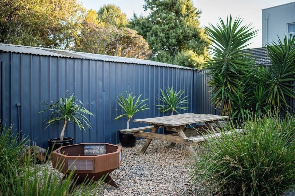 The backyard also offers a fire pit, perfect for cosying up under the stars.