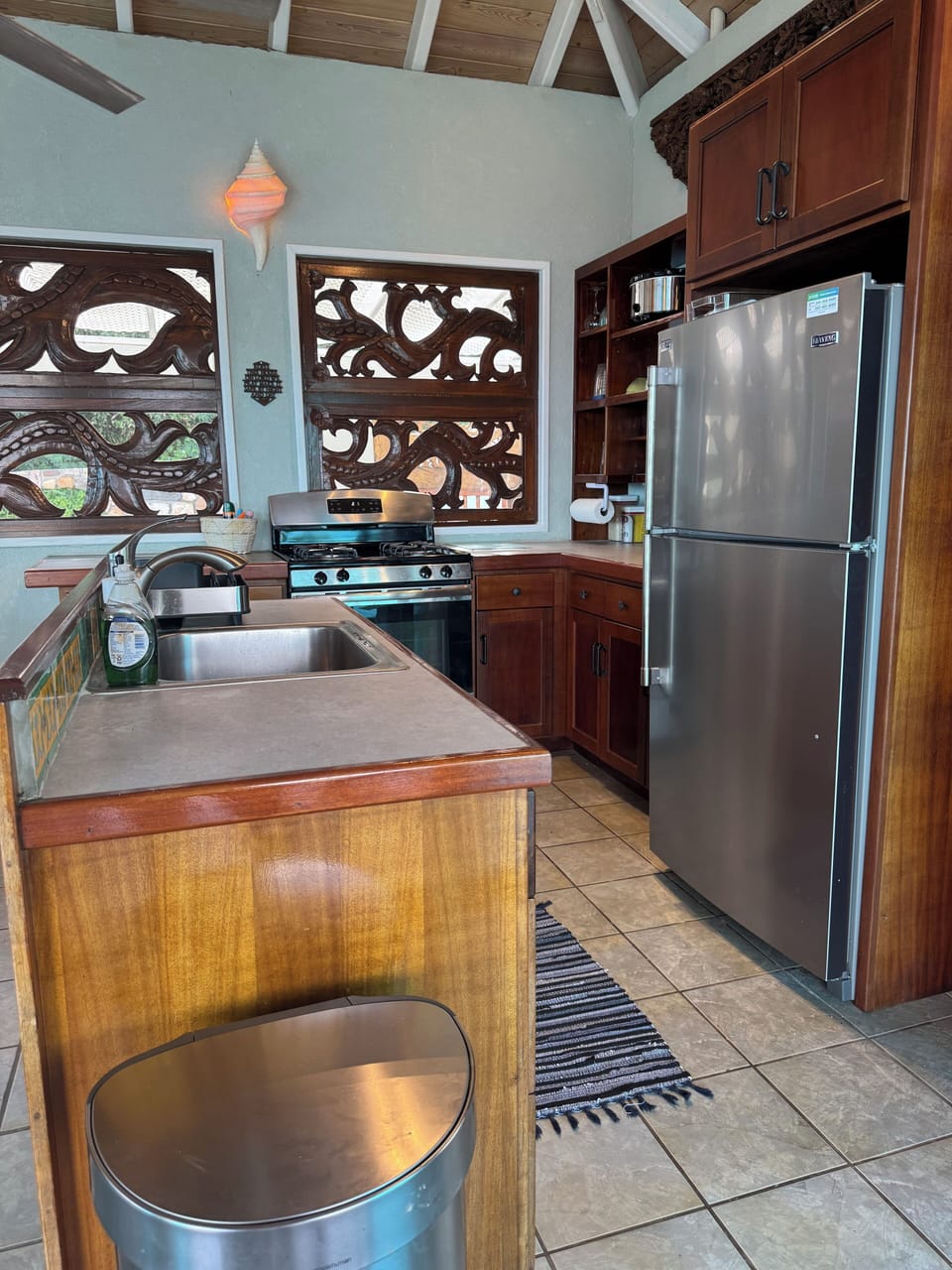 Full kitchen stocked with all cooking and dining essentials.