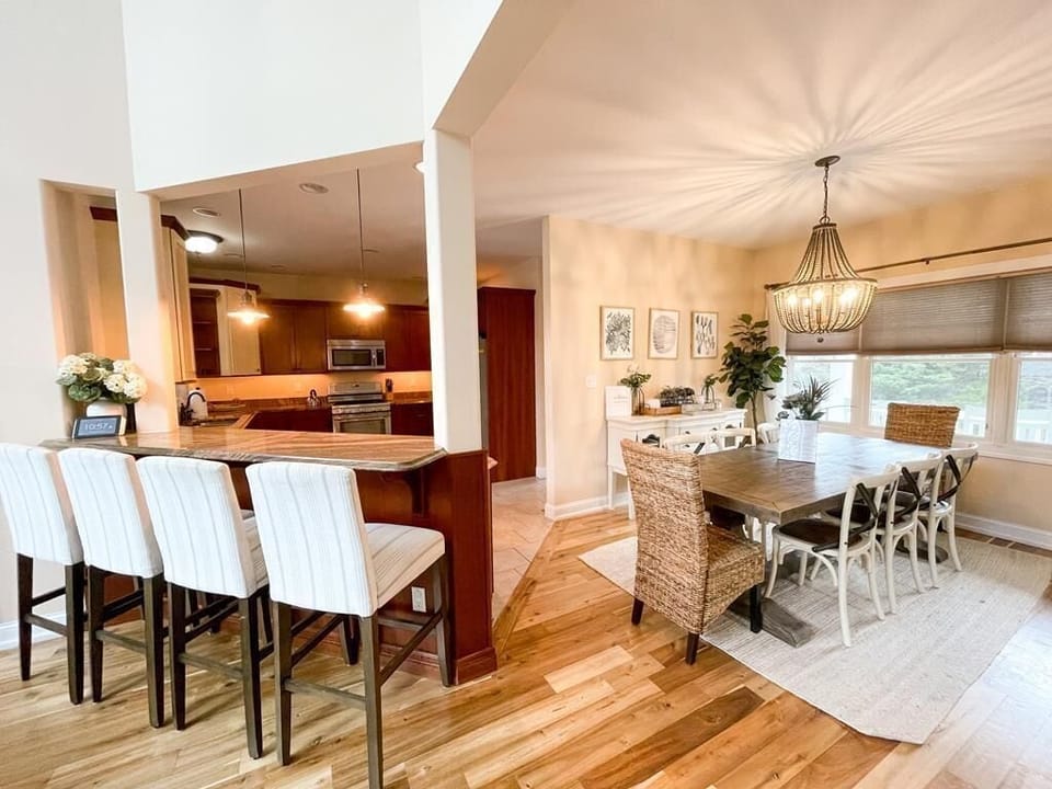 Dining area: large dining table seats 8, plus 4 counter seats.