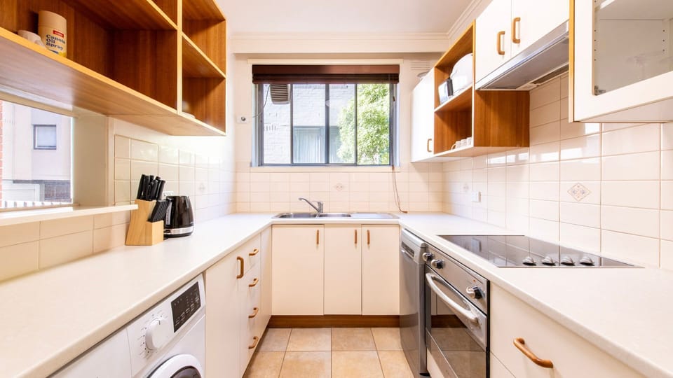 Fully equipped modern kitchen with spacious counters, quality appliances, and plenty of storage for easy everyday cooking.