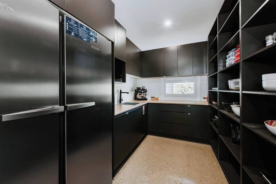 The chef’s kitchen comes with a butler’s pantry with ample space for meal prep and for storage.