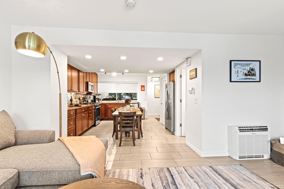 Warm inviting kitchen and living area with cozy seating arrangement. RCT-42
