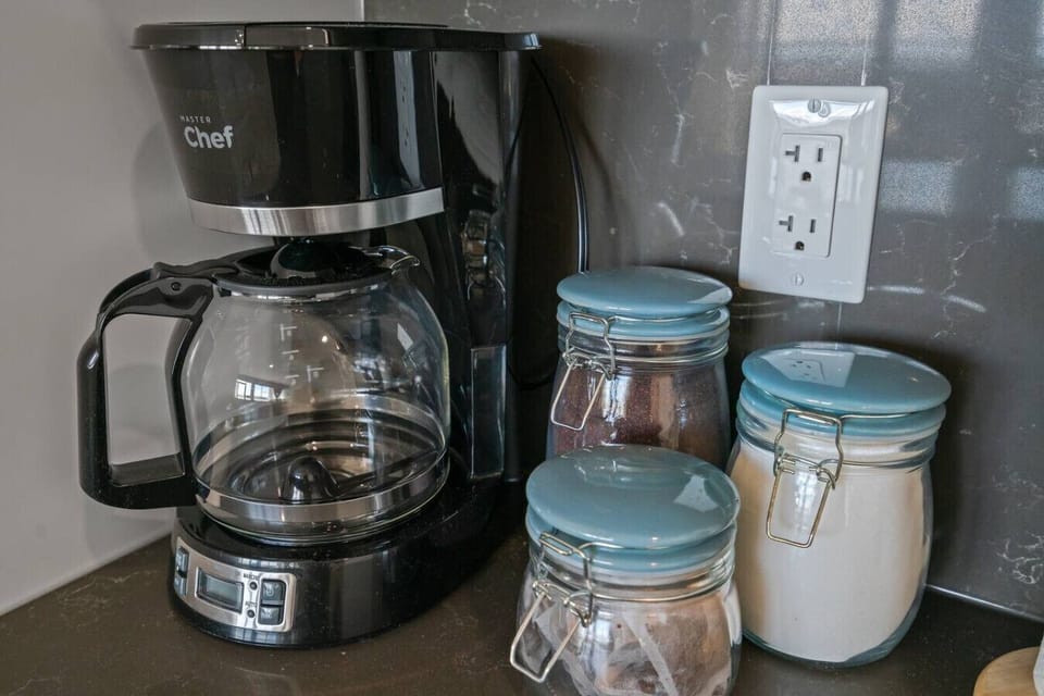 Drip coffee machine with ground coffee, sugar & tea included.