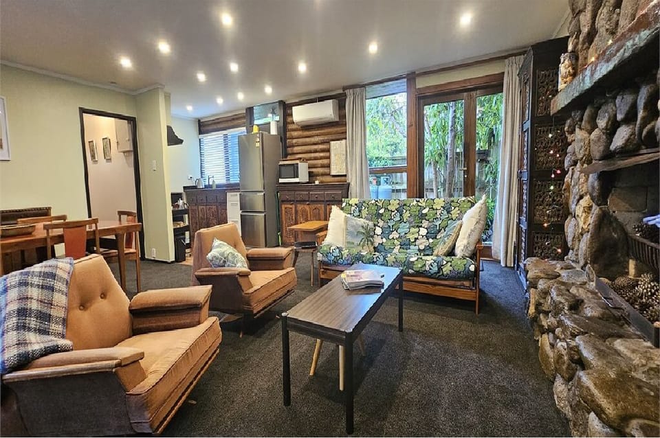 Inside The Iconic Log Cabin by the Sea! Spacious living-dining-kitchen area