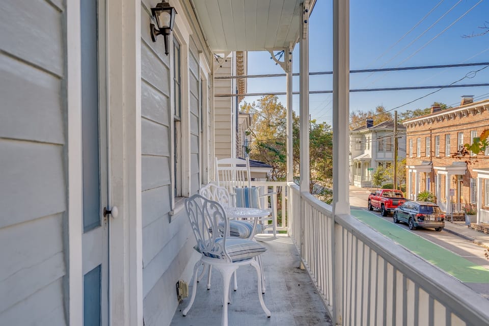 Our upper porch/balcony is accessible from the upstairs landing and connects both duplexes.  A lovely space to relax and soak in the ambiance of Savannah.