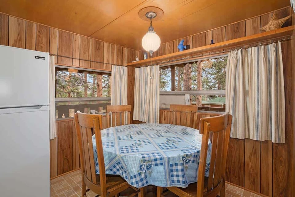 Dining room table for 4 guests in the kitchen.
