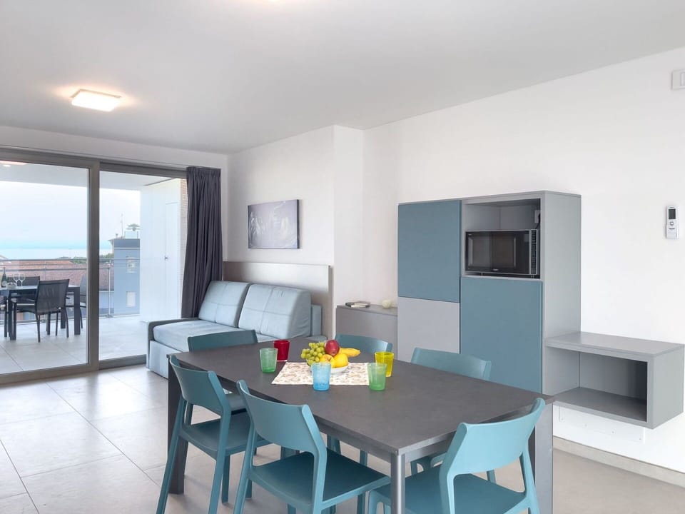 Furniture, Chair, Table, Apartment, Outdoor Furniture, Balcony, Kitchen & Dining Room Table, Condominium, Shade, Patio