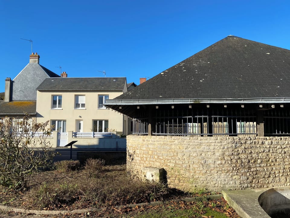 The washhouse and the house