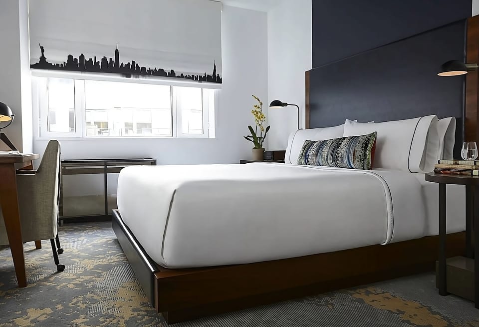 Sink into crisp linens for a deeply restful night’s sleep.
