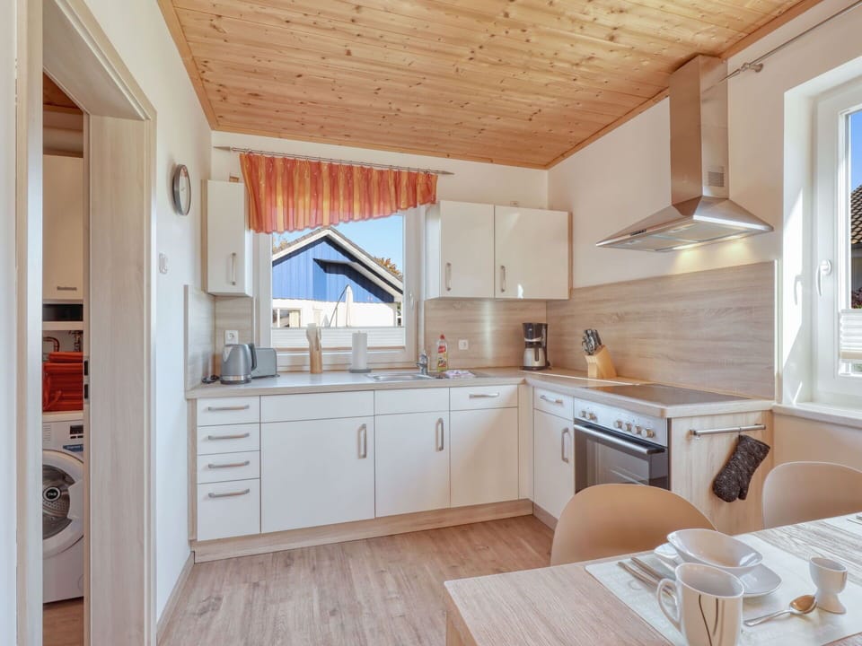 Cabinetry, Countertop, Furniture, Property, Kitchen, Wood, Sink, Kitchen Stove, Drawer, Flooring