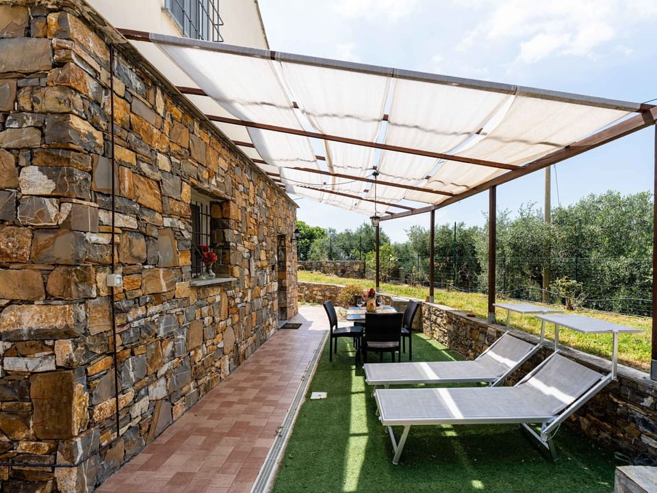 Composite Material, Shade, Stone Wall, Chair, Outdoor Furniture, Eco Hotel, Flagstone, Outdoor Structure, Pergola, Houseplant