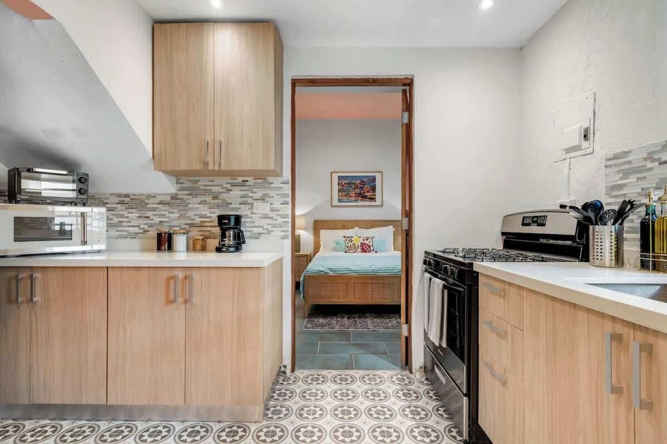 Fully equipped kitchen with modern appliances.
