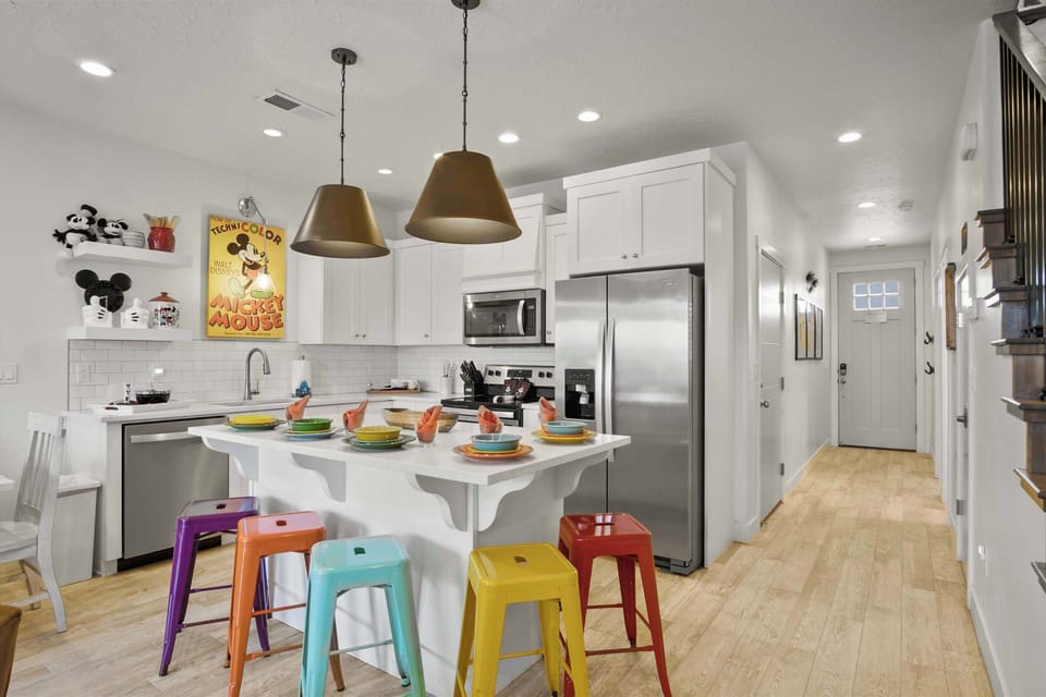 Enjoy breakfast at the counter, offering additional seating for 5