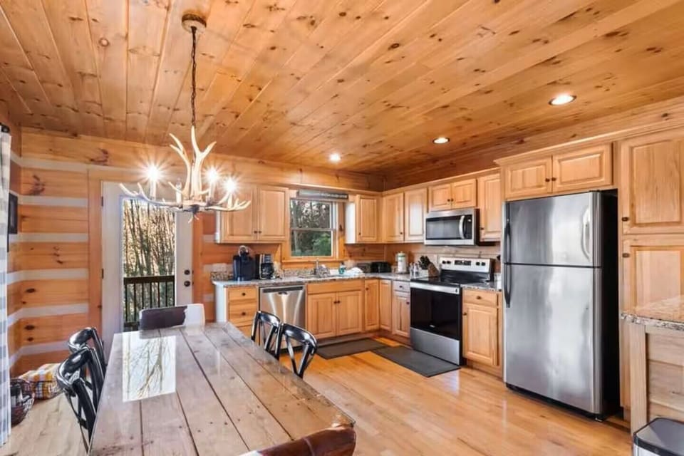 Hot tub & grill are located right outside of the kitchen. 