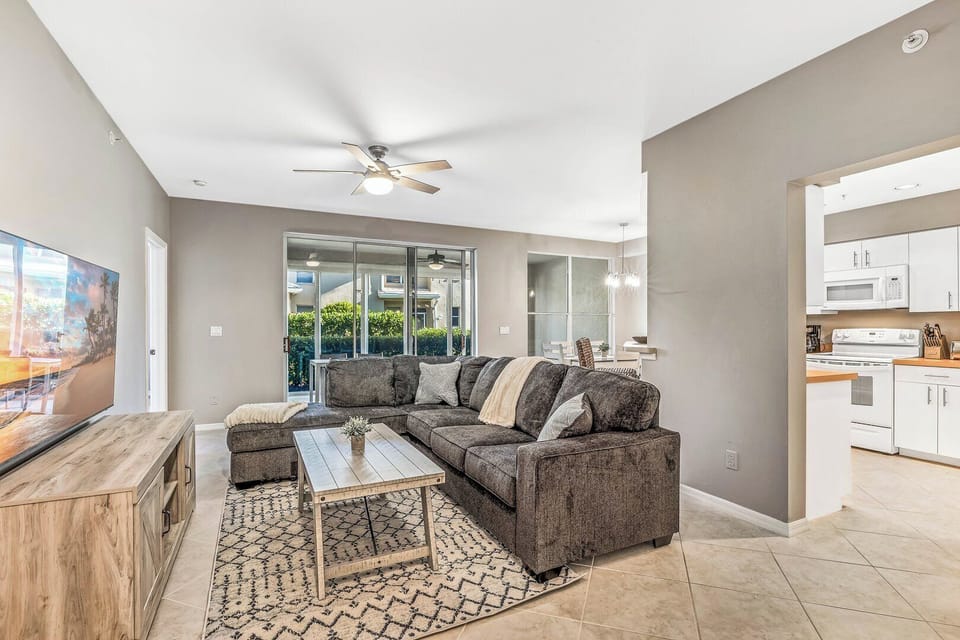 Comfortable living room furniture & plenty of sunlight