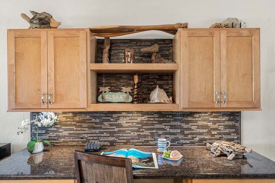 Functional cabinets paired with decorative accents for a warm, inviting feel