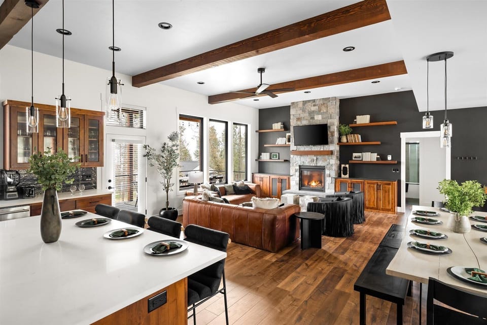 Experience effortless elegance in this luxurious open floor concept, seamlessly connecting the living, kitchen, and dining areas for the ultimate in modern living.