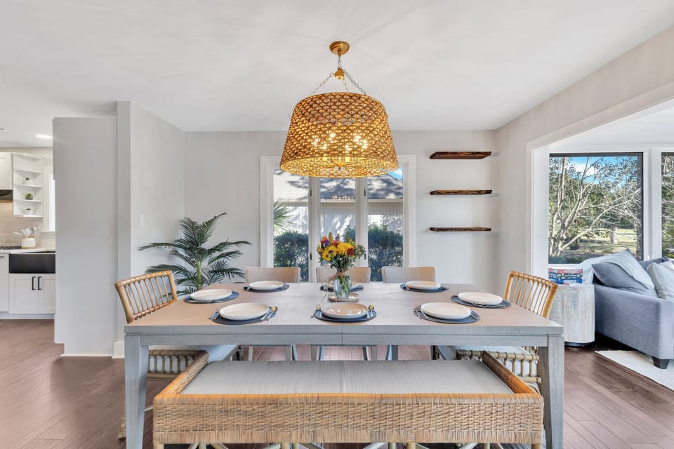 The home features an open floor plan, seamlessly connecting the living room, dining area, and kitchen so no one is left behind while doing the chef's chores.
