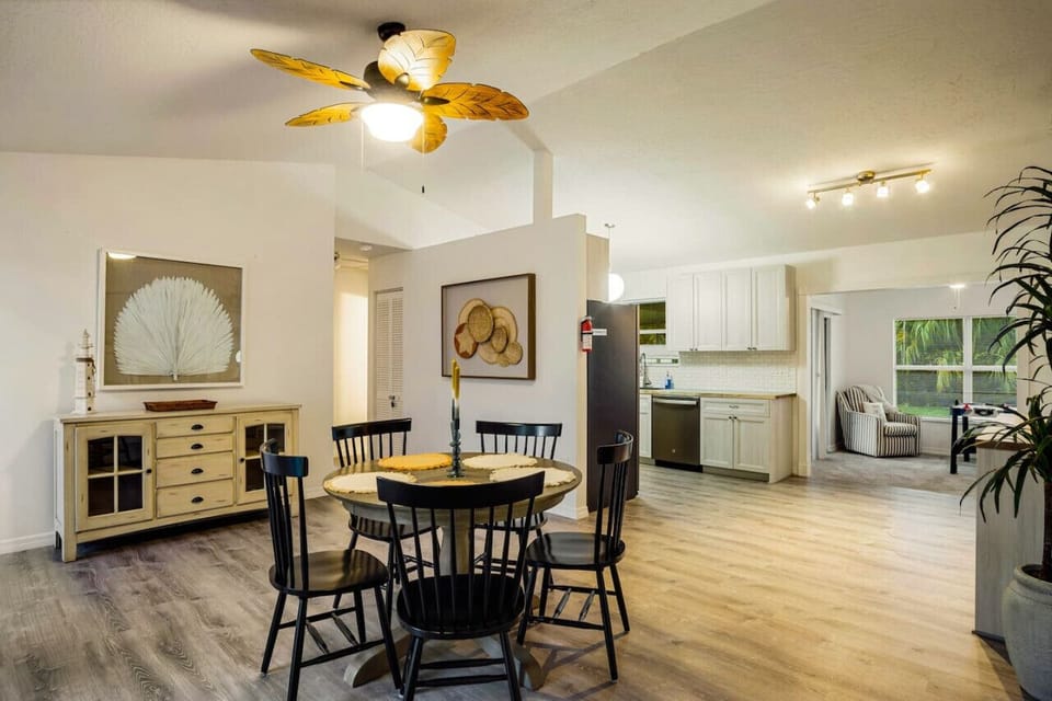 Spacious dining area with stylish décor — ideal for shared meals, game nights, or gathering with family & friends.