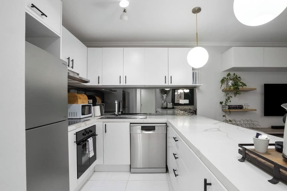 The modern kitchen is fully equipped with everything you’ll need to prepare meals at home and a dishwasher for easy clean-up.