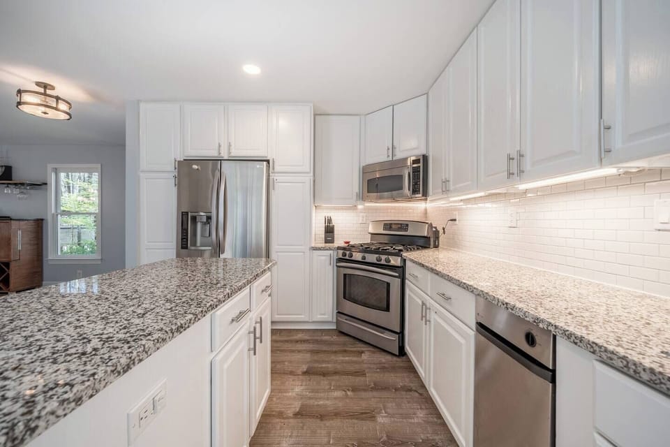 Complete with kitchen island, the large and upgraded kitchen has everything you'll need for your stay, including pots and pans, cooking oils and spices.