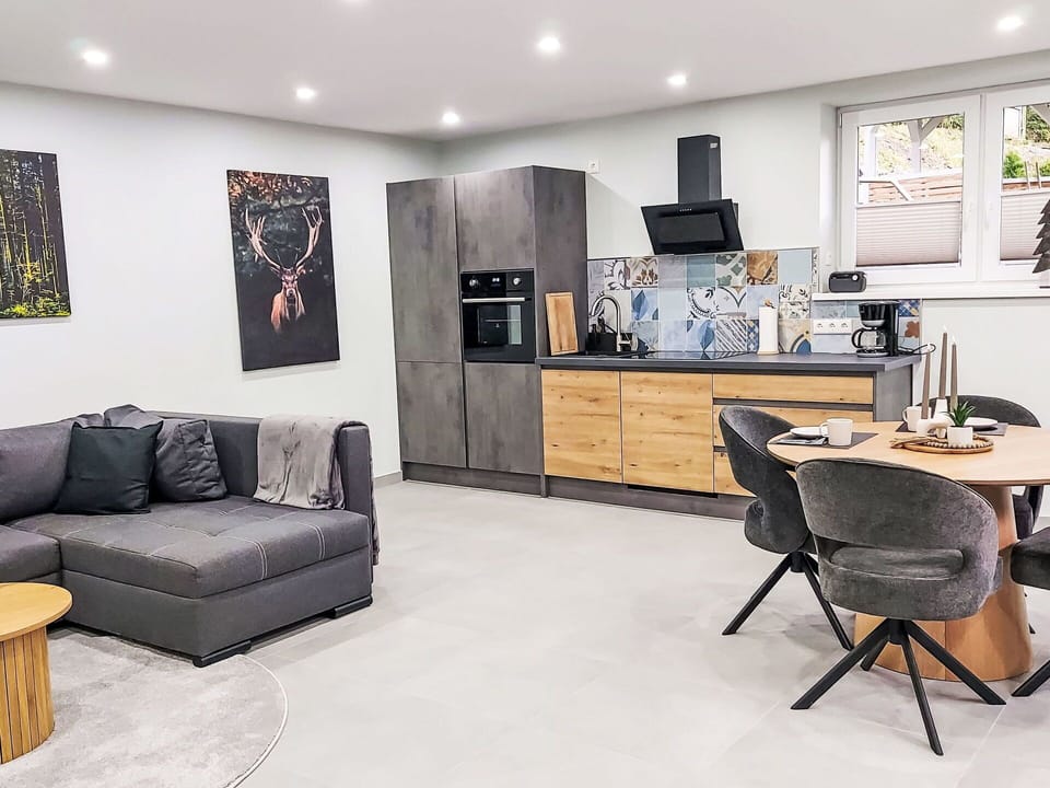 Furniture, Interior Design, Flooring, Floor, Wood, Room, Wood Flooring, Lighting, Chair, Ceiling