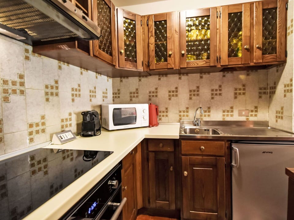 Kitchen, Countertop, Cabinetry, Interior Design, Kitchen Appliance, Wood, Major Appliance, Flooring, Floor, Lighting
