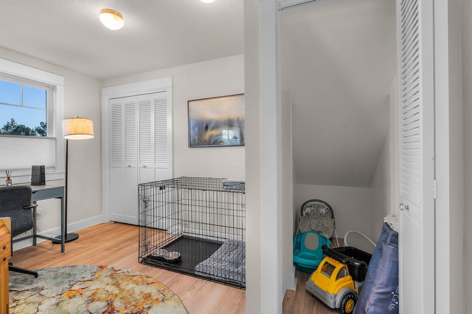 Dog crate and baby items for guest use
