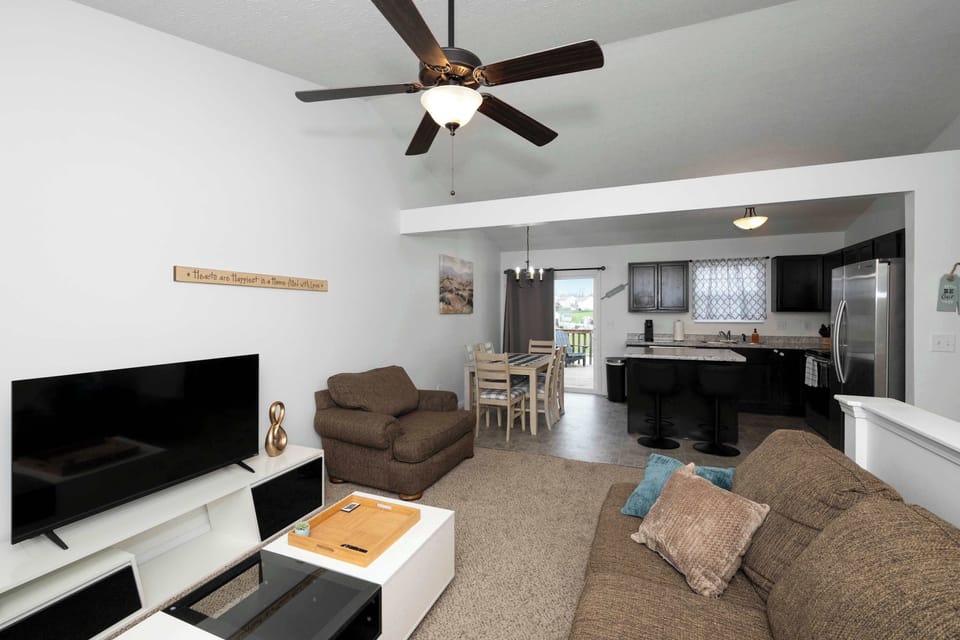 Lounge in the comfy living room & stream your favorites on the smart TV