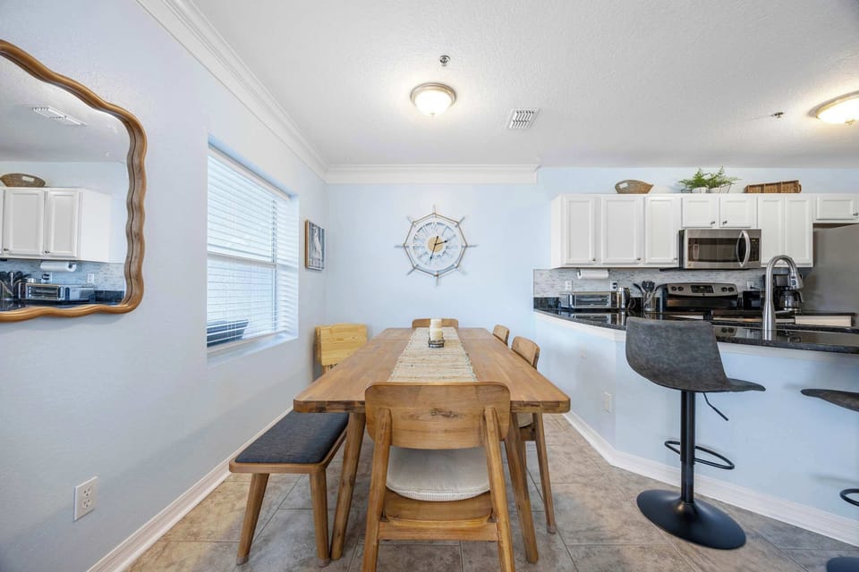 Dining table with seating for 6  and additional counter seating 