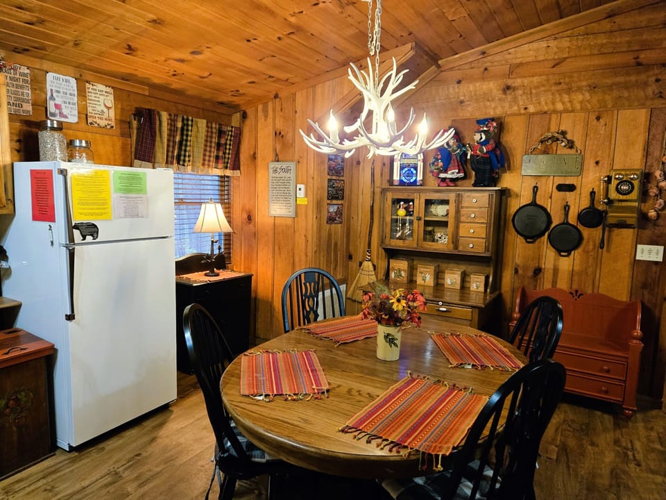 The large dining table has plenty of room for stay-at-home meals for 4 people