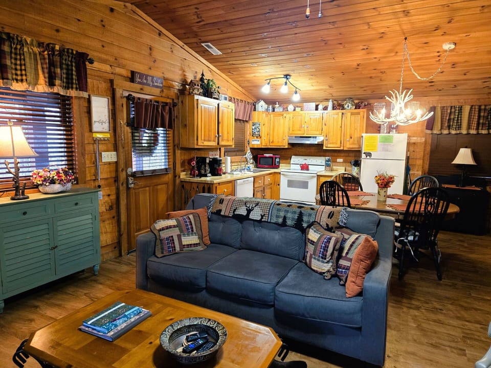 You will feel right at home in the open floor plan of the beautiful log cabin