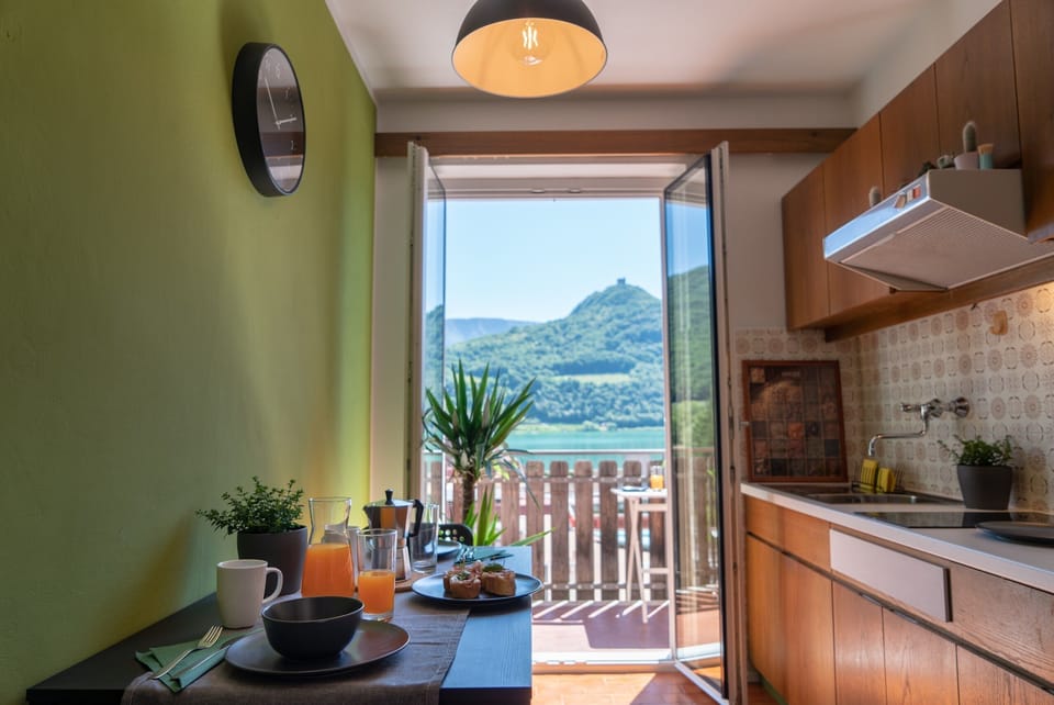 Kitchen with dining area and lake view