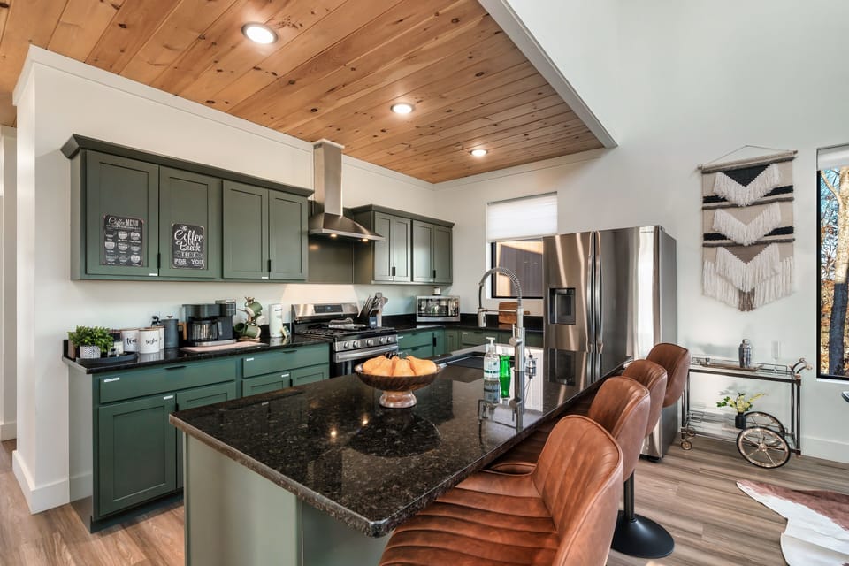 Step into a world of fresh and vibrant design with our green cabinetry kitchen