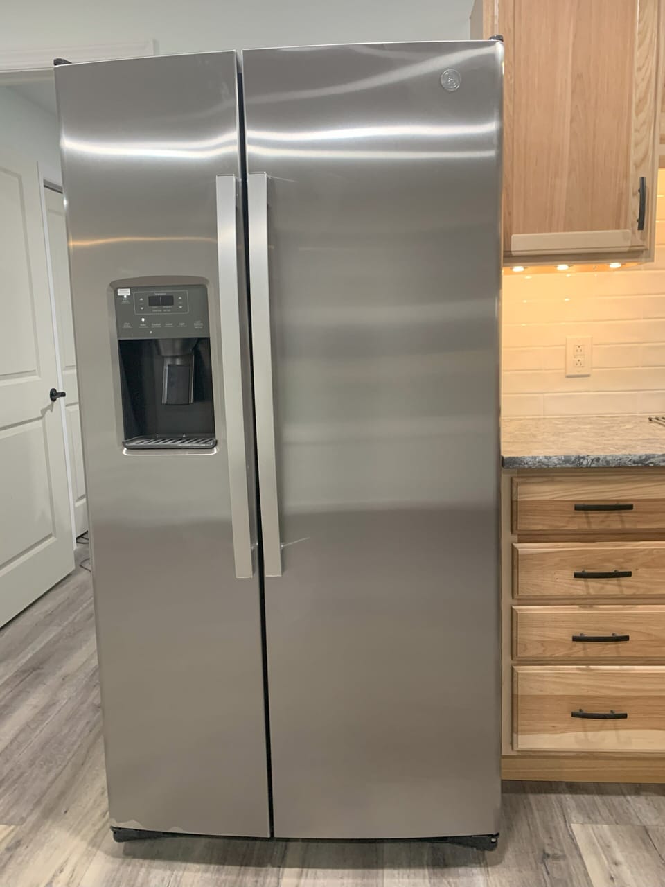 brand new upright refrigerator/freezer