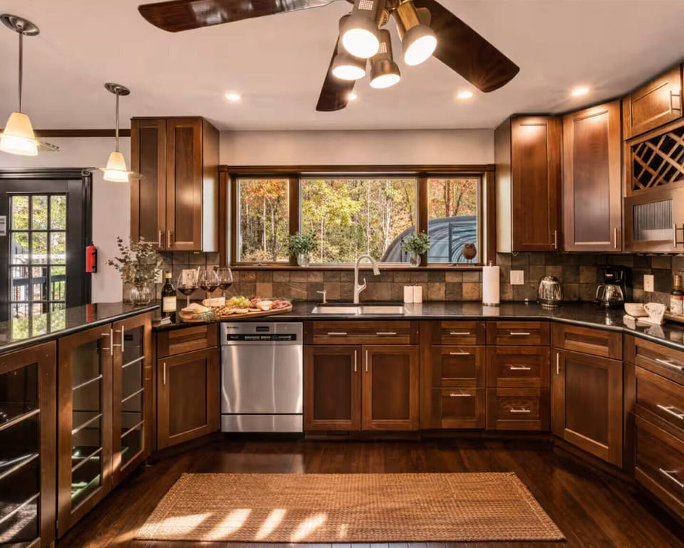 Spacious layout with stainless steel appliances and large windows.