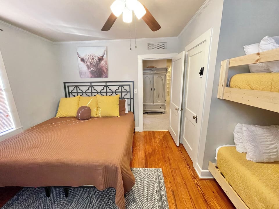 King bedroom with twin bunk bed